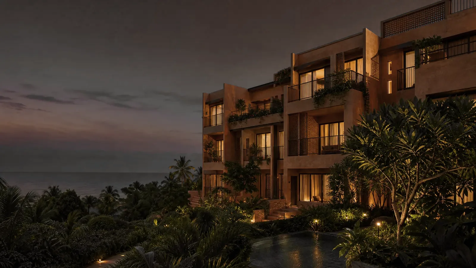 A coastal property lit for the evening